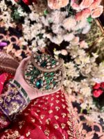 Gold and green clutch