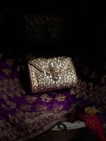Kundan gold clutch