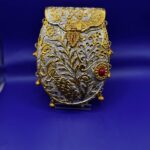 Mor mahal gold clutch
