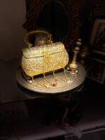Bridal Gold tussle butterfly clutch - Image 5
