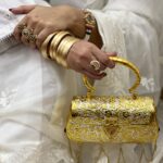 Bridal Gold tussle butterfly clutch