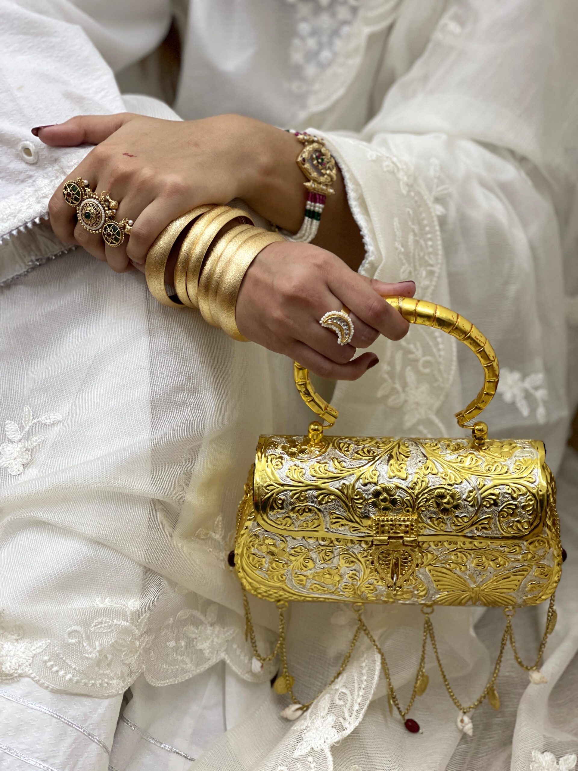 WhatsApp Image 2026-03-20 at 02.48.55 Bridal Gold tussle butterfly clutch - Image 1